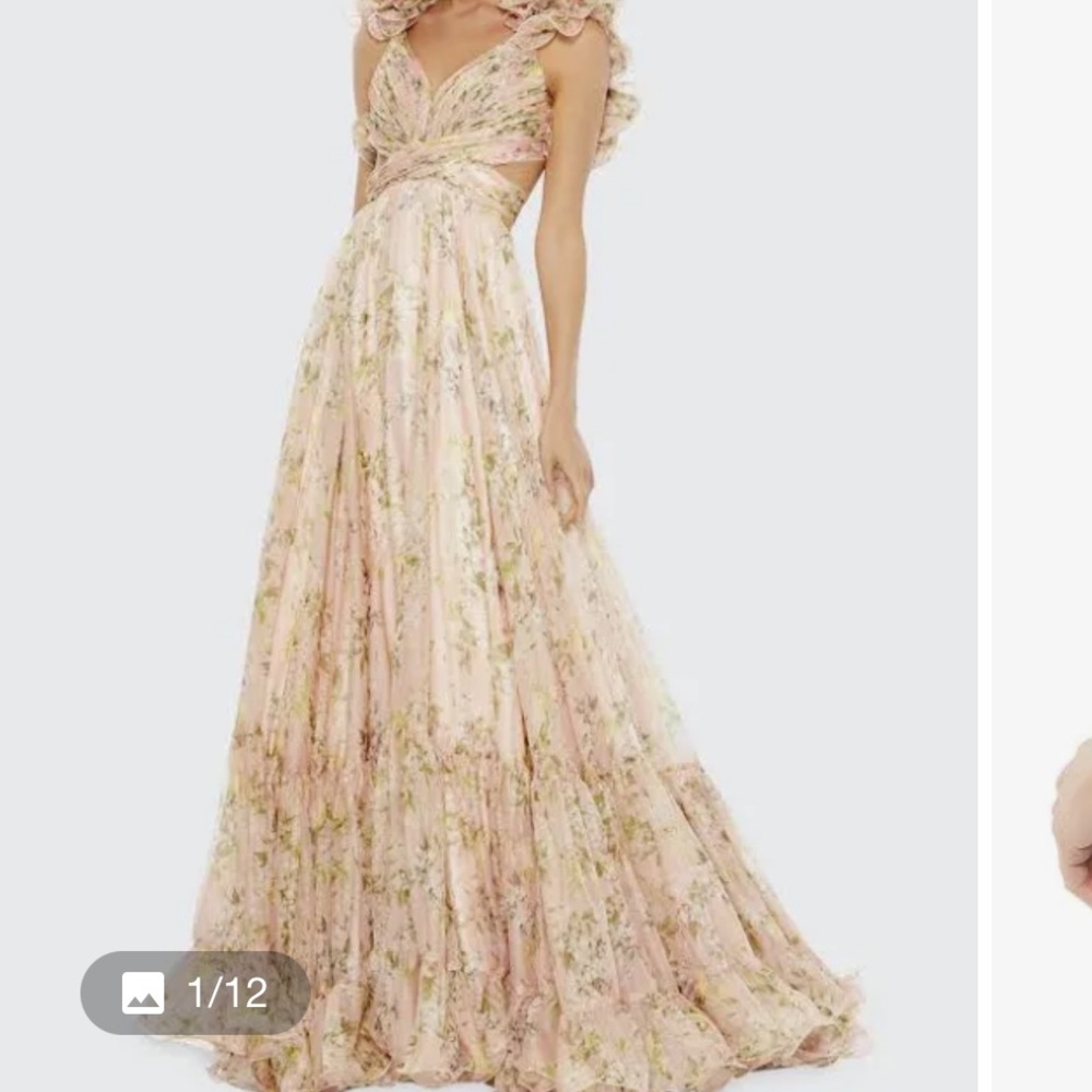 Pink floral Mac Duggal gown with ruffles and cutouts